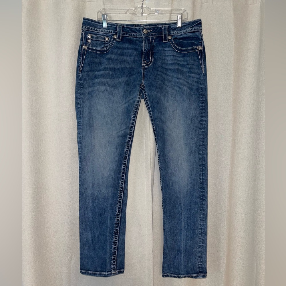 Miss Me Skinny Jeans. Bejeweled pockets.